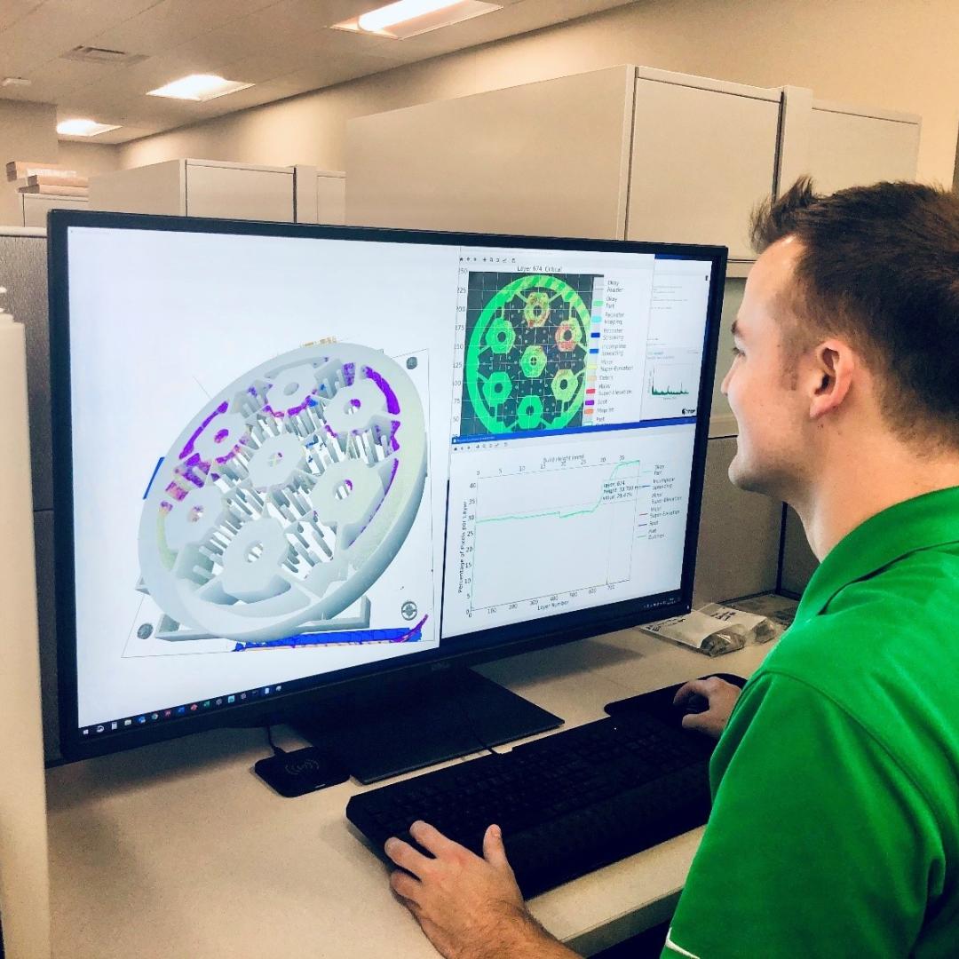 Researcher Chase Joslin uses Peregrine software to monitor and analyze a component being 3D printed at the Manufacturing Demonstration Facility at ORNL. Credit: Luke Scime/ORNL, U.S. Dept. of Energy.