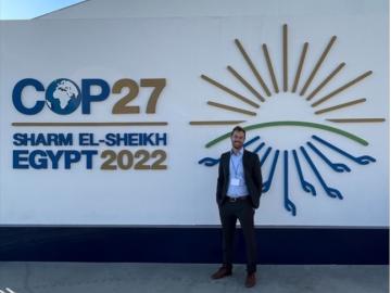 ORNL’s David McCollum, pictured at the entrance to COP27 in Sharm El-Sheikh Egypt, was one of more than 35,000 attendees at the annual United Nations Framework Convention on Climate Change. Credit: David McCollum