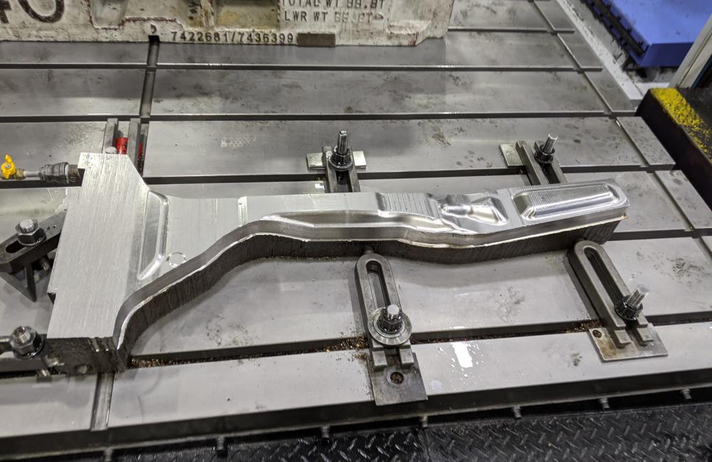 metal arc welded die on a machining platform 