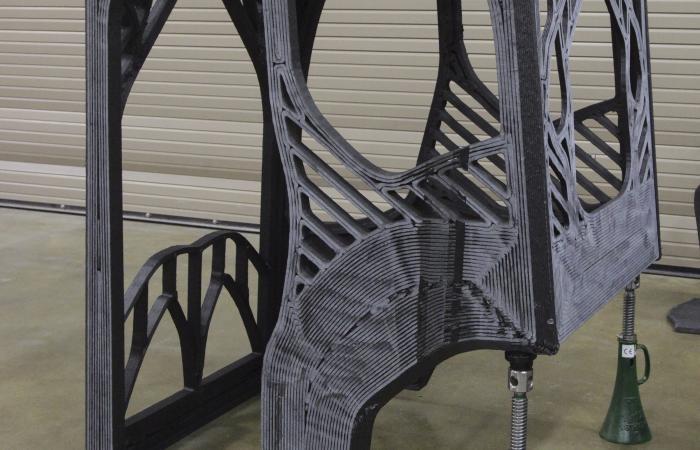 The first-ever 3D printed excavator will include a cab designed by a University of Illinois at Urbana-Champaign student engineering team and printed at DOE’s Manufacturing Demonstration Facility at ORNL using carbon fiber-reinforced ABS plastic. 