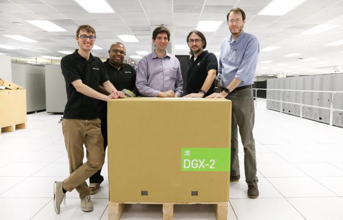 (From left to right) Cole Freniere and Michael Reynolds of Microway, Alex Volkov of NVIDIA, and Chris Layton and Brian Zachary of ORNL pose with a newly arrived DGX-2.