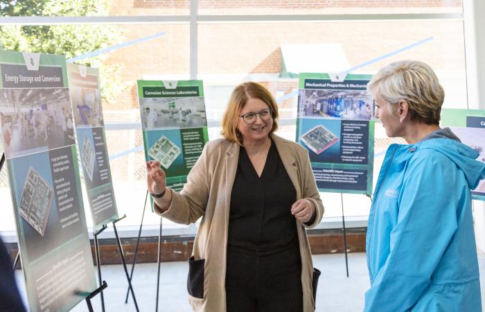 ORNL's Cynthia Jenks discussed the benefits of an advanced scientific research building, called the Translational Research Capability facility - currently under construction at ORNL - with Energy Secretary Jennifer Granholm. Credit: Carlos Jones/ORNL, U.S. Dept. of Energy