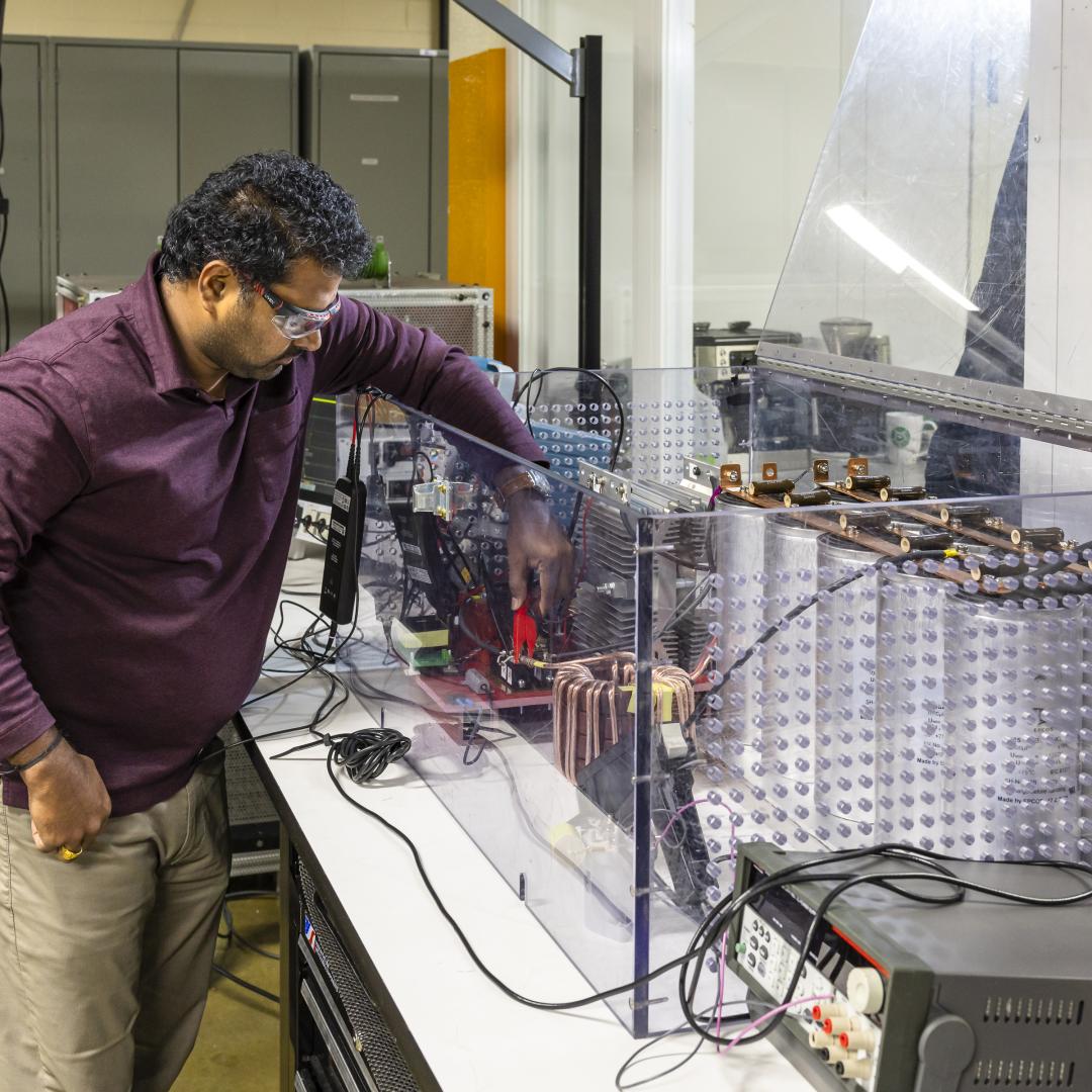 Prasad Kandula builds a medium-voltage solid state circuit breaker as part of ORNL’s project to develop medium-voltage power electronics in GRID-C. Credit: Carlos Jones/ORNL, U.S. Dept. of Energy