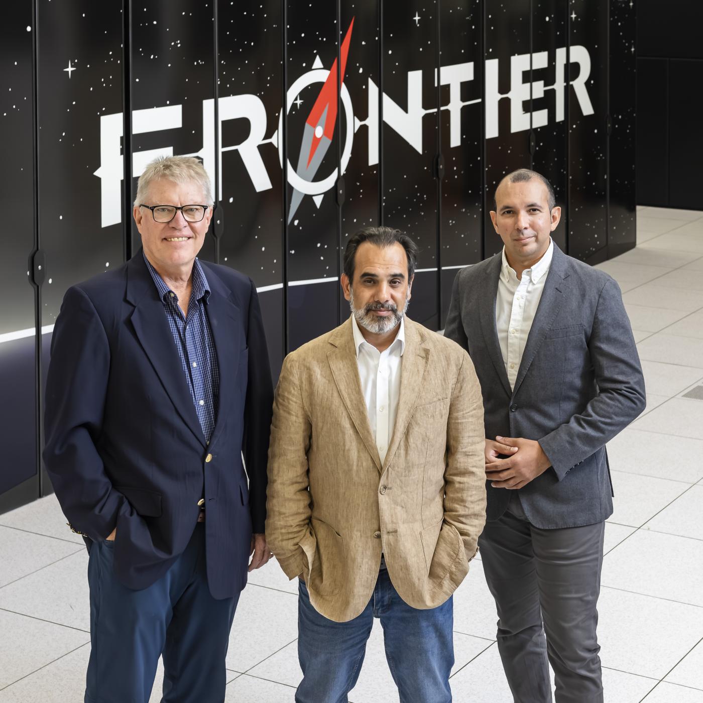 ORNL researchers Tom Beck, left, Sarp Oral and Rafael Ferreira da Silva have proposed a strategy for integrating classical supercomputers such as Frontier, the world’s first exascale computer, with the emerging field of quantum computing.