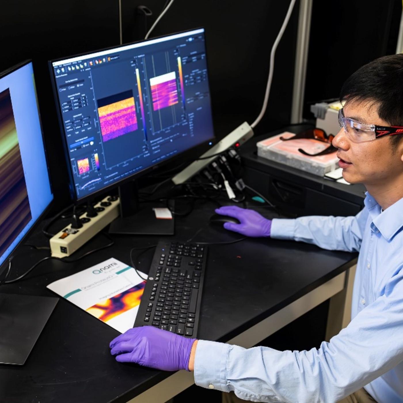 Eugene P. Wigner Fellow Huan Zhao working in his lab