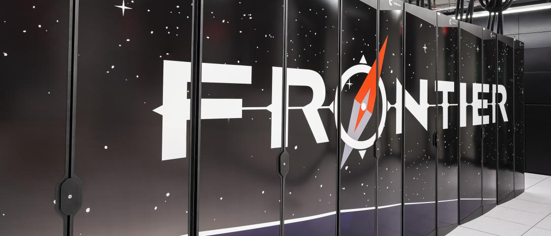 Front row of the Frontier supercomputer showing the logo against a black background.