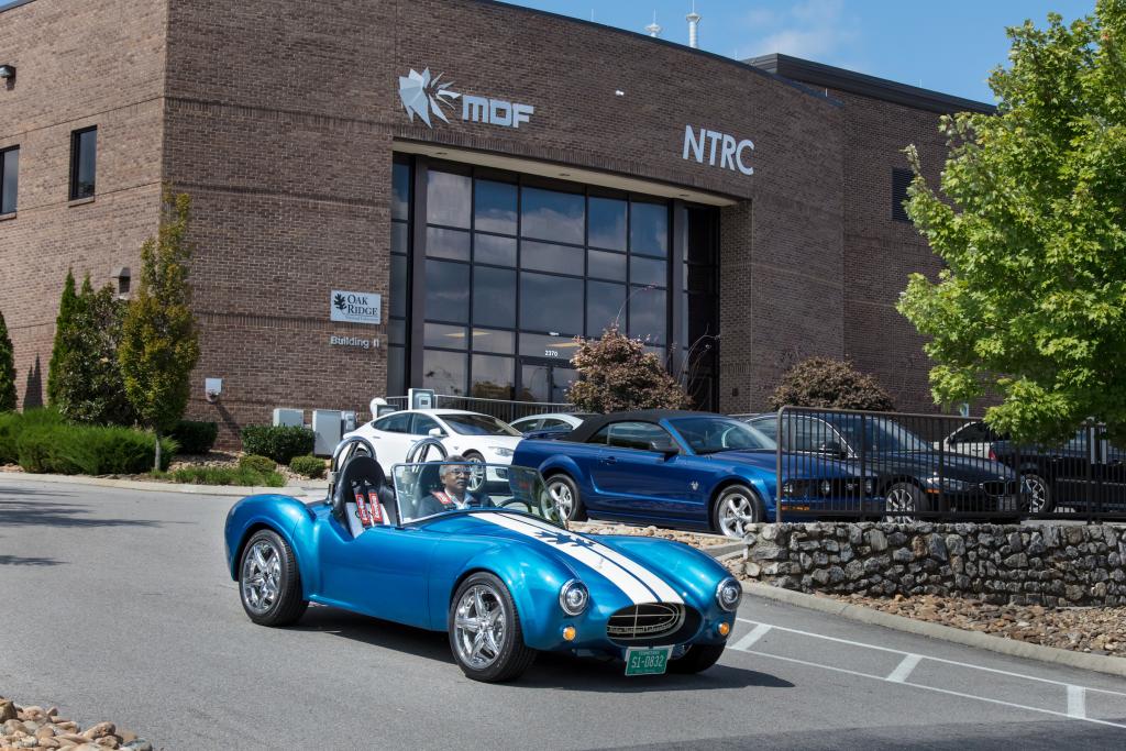 Lab Director, Thomas Zacharia, driving the 3D Printed Shelby Cobra