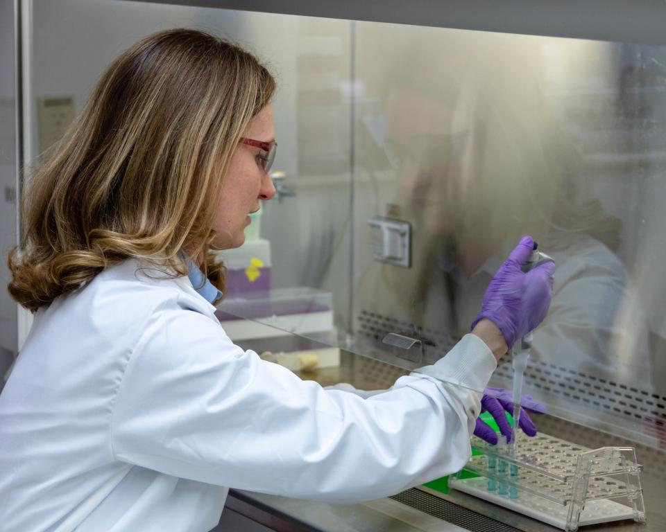 Amber McBride working in the biosciences laboratory at Oak Ridge National Laboratory