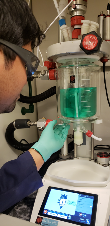 Nitin Muralidharan, a postdoctoral researcher at ORNL, performs synthesis of a cathode material using a continuous stirred tank reactor for the development of cobalt-free batteries. Credit: Ilias Belharouak/Oak Ridge National Laboratory, U.S. Dept. of Energy