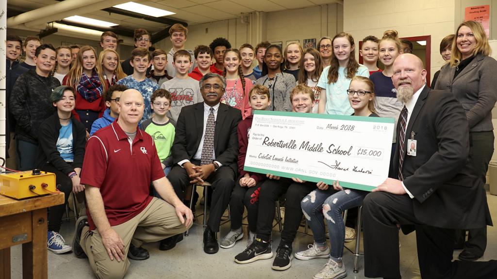 In 2018, ORNL Director Thomas Zacharia visited Robertsville Middle School to learn about RamSat and present a donation of $15,000 on behalf of UT-Battelle. Credit: Jason Richards/ORNL, U.S. Dept. of Energy