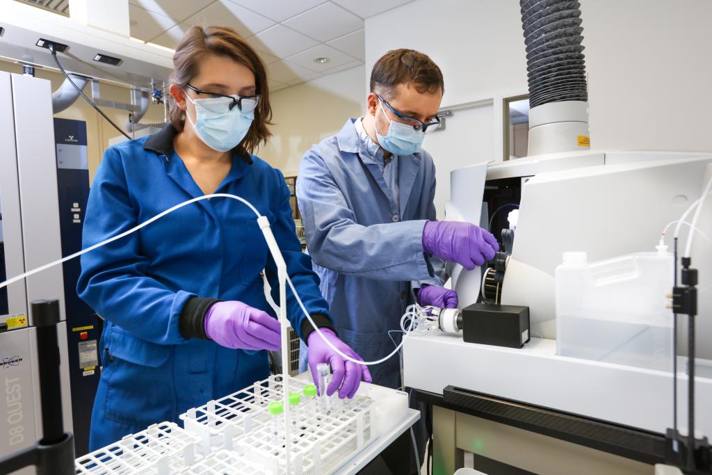 researchers in a lab