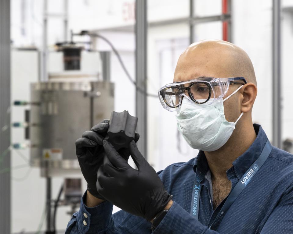 Ultra Safe Nuclear Corporation has licensed a novel method to 3D print highly resistant components for use in nuclear reactor designs. USNC Executive Vice President Kurt Terrani, formerly of ORNL, said the novel method will allow the company to make parts with desired complex shapes more efficiently. Credit: Carlos Jones/ORNL, U.S. Dept. of Energy