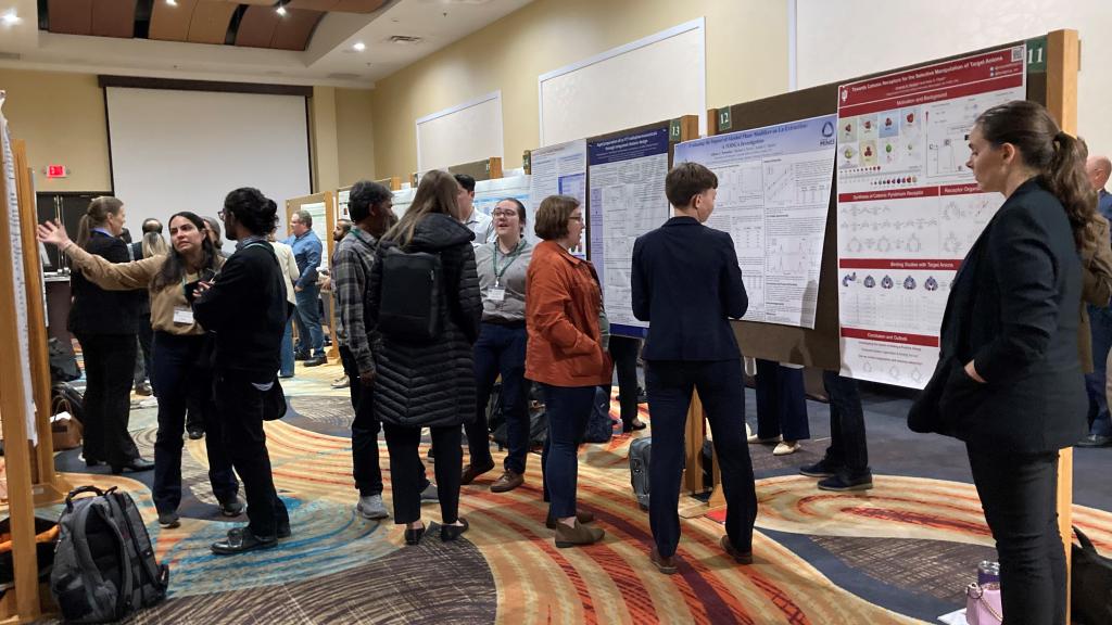  Symposium guests view posters in the poster competition. Credit: Laetitia Delmau/ORNL, U.S. Dept. of Energy 