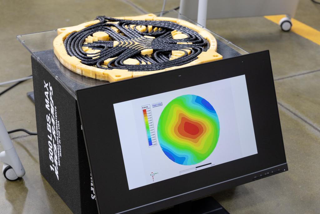 ORNL's lightweight polyphase electromagnetic coupling coil design, with a diameter just over 14 inches, allows for higher power density in smaller coils and includes rotating magnetic fields generated by coil phase windings. Credit: Genevieve Martin/ORNL, U.S. Dept. of Energy