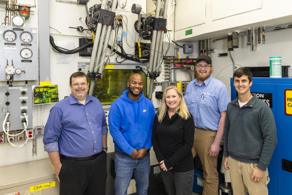 Team members at ORNL’s Radiochemical Engineering Development Center, where the promethium sample was purified, included, from left, Richard Mayes, Frankie White, April Miller, Matt Silveira and Thomas Dyke. Credit: Carlos Jones/ORNL, U.S. Dept. of Energy