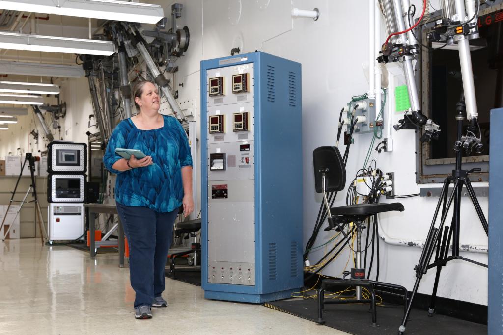 Sara Martinez walks through the Radiochemical Engineering Development Center, one of the buildings she routinely analyzes for structural issues. Credit: Genevieve Martin/ORNL, U.S. Dept. of Energy