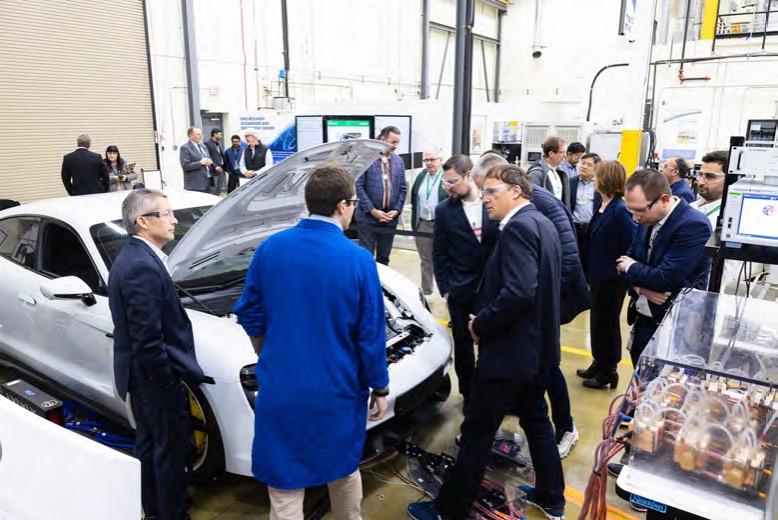 Volkswagen Group officials visited ORNL to view the lab's novel lightweight polyphase electromagnetic charging system, capable of transferring unprecedented power to electric vehicles. 