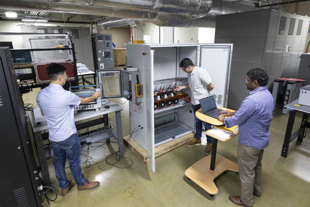 Three researchers in a lab