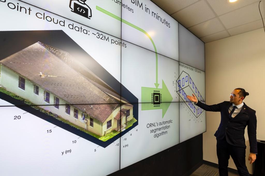 Maldonado shows how ORNL-developed algorithms created a digital twin of a building that enabled the design of exterior wall panels to improve the energy efficiency of a Knoxville, Tennessee housing development. 