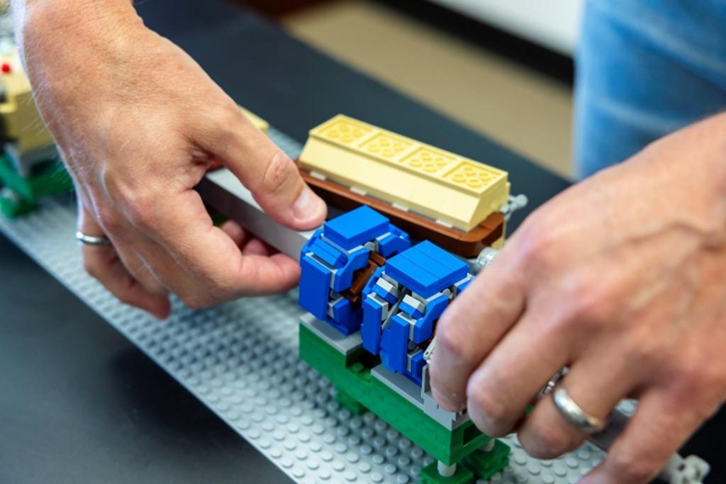 LEGO model of the ring injection region of the SNS' pulsed accelerator that features the new Proton Power Upgrade magnets and vacuum chambers. 