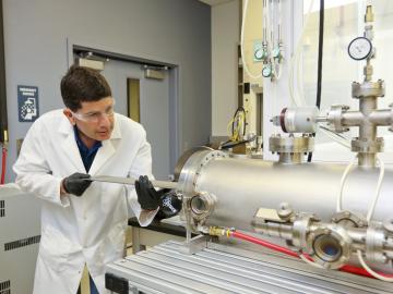 ORNL’s Tolga Aytug uses thermal processing and etching capabilities to produce a transparent superhydrophobic coating technology. The highly durable, thin coating technology was licensed by Carlex Glass America, aimed initially at advancing superhydrophob ORNL’s Tolga Aytug uses thermal processing and etching capabilities to produce a transparent superhydrophobic coating technology. The highly durable, thin coating technology was licensed by Carlex Glass America, aimed initially at advancing superhydrophob