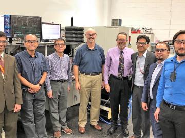 Researchers demonstrated 120 kilowatt wireless power transfer at the National Transportation Research Center, a DOE Office of Science User facility at Oak Ridge National Laboratory. From L-R: ORNL’s Saeed Anwar, Burak Ozpineci, Gui-Jia Su, and David Smith Researchers demonstrated 120 kilowatt wireless power transfer at the National Transportation Research Center, a DOE Office of Science User facility at Oak Ridge National Laboratory. From L-R: ORNL’s Saeed Anwar, Burak Ozpineci, Gui-Jia Su, and David Smith