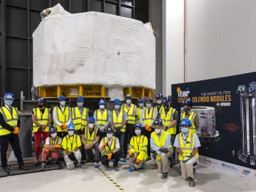 ITER staff in front of first central solenoid module