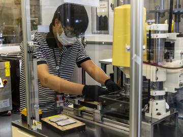 Jianlin Li employs ORNL’s world-class battery research facility to validate the innovative safety technology. Credit: Carlos Jones/ORNL, U.S. Dept. of Energy