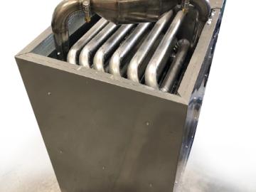 Oak Ridge National Laboratory researchers built a prototype natural gas furnace that uses acidic gas reduction technology to remove or trap potentially environmentally harmful emissions. Credit: ORNL, U.S. Dept. of Energy