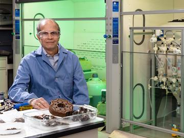 Oak Ridge National Laboratory’s Ramesh Bhave partnered with Momentum Technologies to develop a modular, scalable system for recycling scrap permanent magnets in e-waste. Credit: Carlos Jones/ORNL, U.S. Dept. of Energy