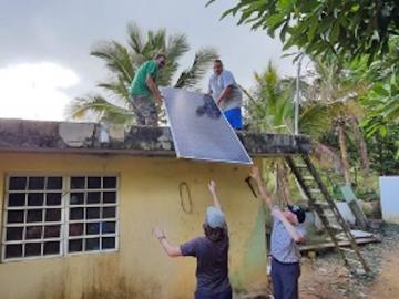 Solar panels funded by the Honnold Foundation are installed in Adjuntas, Puerto Rico. Credit: Fabio Andrade