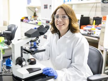 Fungal geneticist Joanna Tannous is gaining a better understanding of the genetic processes behind fungal life to both combat plant disease and encourage beneficial processes like soil carbon storage. Credit: Carlos Jones/ORNL, U.S. Dept. of Energy