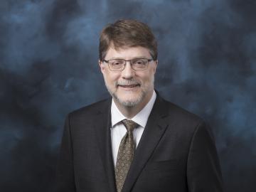 Formal headshot of ORNL Director Stephen Streiffer
