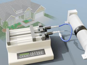 An encapsulation system developed by ORNL researchers prevents salt hydrates, which are environmentally friendly thermal energy storage materials, from leaking and advances their use in heating and cooling applications. Credit: Andy Sproles/ORNL, U.S. Dept. of Energy