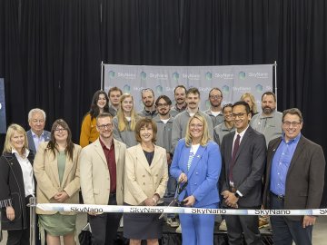 Representatives from several local partners attended a ribbon-cutting for the new SkyNano facility in Louisville, Tennesse. Front row, from left to right are Deborah Crawford, vice chancellor for research at the University of Tennessee, Knoxville; Tom Rogers, president and chief executive officer of the UT Research Park; Lindsey Cox, CEO of LaunchTN; Cary Pint, SkyNano co-founder and chief technology officer; Susan Hubbard, ORNL deputy for science and technology; Anna Douglas, SkyNano co-founder and CEO; Ch
