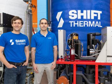 Shift Thermal co-founders Mitchell Ishamel, left, and Levon Atoyan stand in front of one of the company’s ice thermal energy storage modules, which will be submitted to independent measurement and validation testing in May. Credit: Genevieve Martin/ORNL, U.S. Dept. of Energy