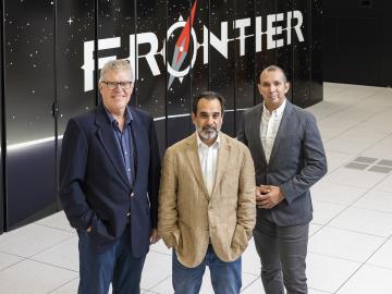 ORNL researchers Tom Beck, left, Sarp Oral and Rafael Ferreira da Silva have proposed a strategy for integrating classical supercomputers such as Frontier, the world’s first exascale computer, with the emerging field of quantum computing.