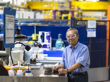 Takeshi Egami stands at his workstation at ORNL’s Spallation Neutron Source where he used novel experimental methods to propose the density wave theory. Credit: Carlos Jones/ORNL, U.S. Dept. of Energy