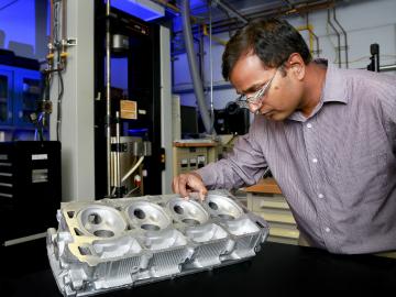 R&D 100 Award winning ACMZ Cast Aluminum Alloys, shown with lead developer Amit Shyam, were developed by a team of researchers from Oak Ridge National Laboratory with Fiat Chrysler Automobile U.S. and Nemak U.S.A.