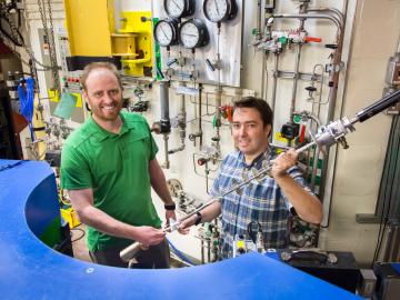 ORNL’s Andrew Christianson and Stuart Calder conducted neutron diffraction studies at the lab’s High Flux Isotope Reactor to clearly define the magnetic order of an osmium-based material. Image credit: ORNL/Genevieve Martin