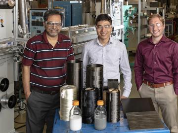 From left, Amit Naskar, Ngoc Nguyen and Christopher Bowland in ORNL’s Carbon and Composites Group bring a new capability—structural health monitoring—to strong, lightweight materials promising for transportation applications.