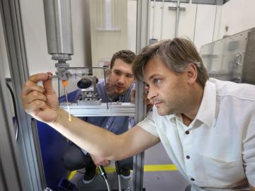 ORNL’s Steven Dajnowicz (left) and Andrey Kovalevsky prepared a sample to begin neutron structural analysis of a vitamin B6-dependent protein using the IMAGINE beamline at ORNL’s High Flux Isotope Reactor. Results of the study could open avenues for new a ORNL’s Steven Dajnowicz (left) and Andrey Kovalevsky prepared a sample to begin neutron structural analysis of a vitamin B6-dependent protein using the IMAGINE beamline at ORNL’s High Flux Isotope Reactor. Results of the study could open avenues for new a