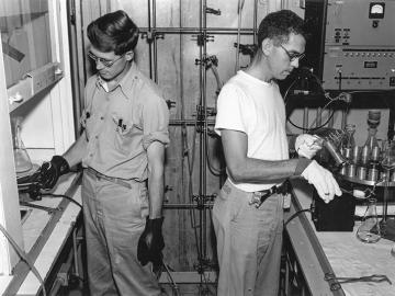 George Parker (left) and co-worker P.M. Lantz doing chemical separations in 1949.