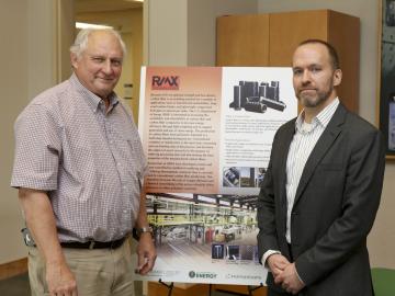 ORNL carbon fiber processing technology co-invented by Felix Paulauskas (left) has been licensed to RMX Technologies, represented by vice president for research and development Truman Bonds.
