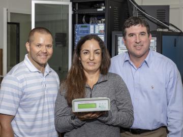 L-R, Researchers Nils Stenvig, Isabelle Snyder and Travis Smith are developing tools and deploying sensors to aid decision-making as Puerto Rico rebuilds and modernizes its power grid. L-R, Researchers Nils Stenvig, Isabelle Snyder and Travis Smith are developing tools and deploying sensors to aid decision-making as Puerto Rico rebuilds and modernizes its power grid.