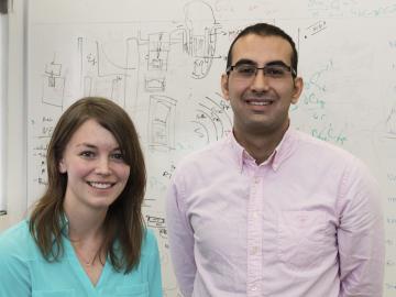 Doctoral student Rachel Seibert works with ORNL mentor Kurt Terrani as part of the lab’s Nuclear Engineering Science Laboratory Synthesis (NESLS) program. 