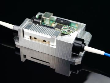 An existing Qubitekk prototype will leverage ORNL’s single-photon source approach, bringing the device closer to generating pairs of quantum light particles in a controlled, deterministic manner that is useful for quantum encryption. Image by Qubitekk. An existing Qubitekk prototype will leverage ORNL’s single-photon source approach, bringing the device closer to generating pairs of quantum light particles in a controlled, deterministic manner that is useful for quantum encryption. Image by Qubitekk.