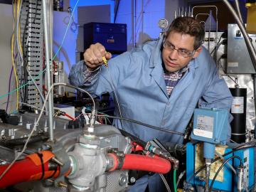ORNL’s Jim Szybist works with a multi-cylinder engine at the lab’s National Transportation Research Center. Credit: Jason Richards/Oak Ridge National Laboratory, U.S. Dept. of Energy ORNL’s Jim Szybist works with a multi-cylinder engine at the lab’s National Transportation Research Center. Credit: Jason Richards/Oak Ridge National Laboratory, U.S. Dept. of Energy