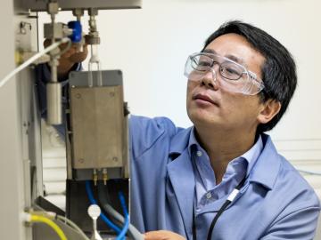 Chemist Zili Wu makes discoveries about catalysts using a suite of sophisticated tools, such as this adsorption microcalorimeter to probe catalytic sites. Image credit: Oak Ridge National Laboratory, U.S. Dept. of Energy; photographer Carlos Jones Chemist Zili Wu makes discoveries about catalysts using a suite of sophisticated tools, such as this adsorption microcalorimeter to probe catalytic sites. Image credit: Oak Ridge National Laboratory, U.S. Dept. of Energy; photographer Carlos Jones