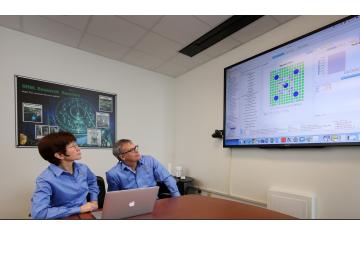 Germina Ilas (left) and Ian Gauld review spent fuel data entries in the SFCOMPO 2.0 database. Germina Ilas (left) and Ian Gauld review spent fuel data entries in the SFCOMPO 2.0 database.